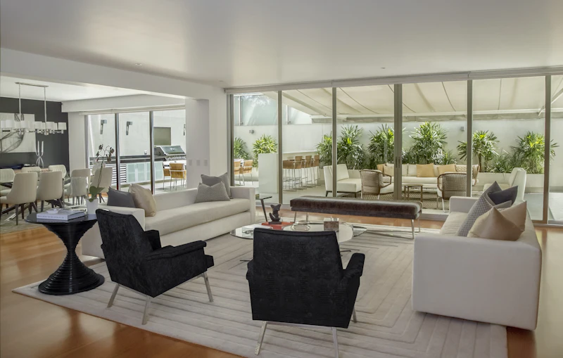 A reception lounge with soft seating and a full-height glazed frontage